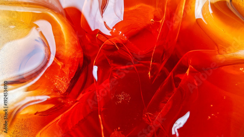 Abstract Macro Shot of Iced Tea with Refracted Amber Light and Ice Cubes