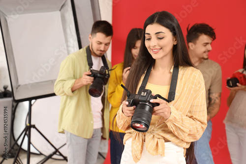 Young female photographer w...
