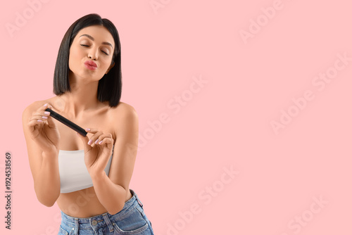 Beautiful young woman with ...
