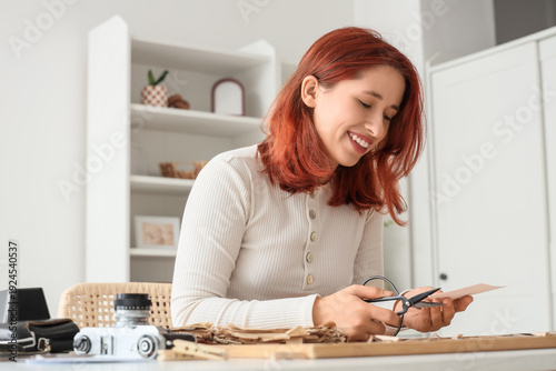 Woman making family tree at...