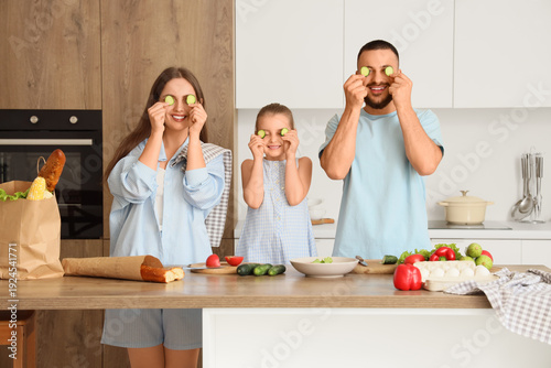 Happy parents with their li...