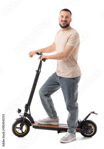 Young man with electric kic...