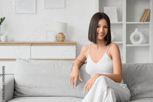 Beautiful young woman with ...