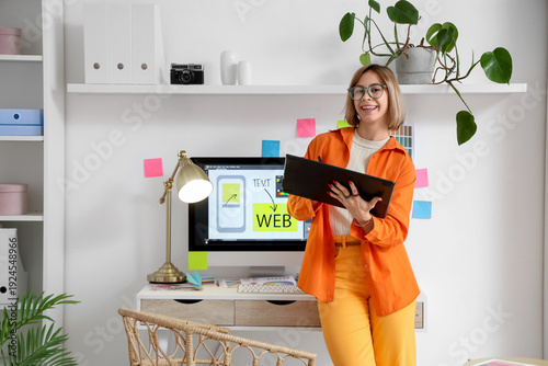 Female web designer with gr...