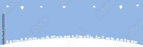 White town silhouette in arc layout on blue background with copy space