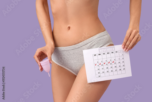 Young woman in panties with...