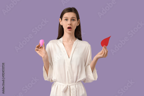 Shocked young woman in bath...