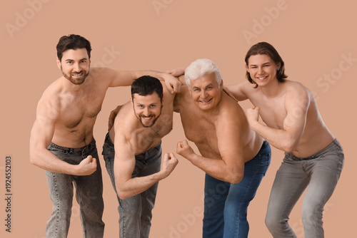 Group of men showing muscle...
