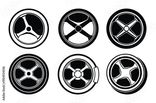 Black and White Wheels Vector Set. Variety of Rim Designs, Automotive Industry, Racing Wheels with Various Spokes