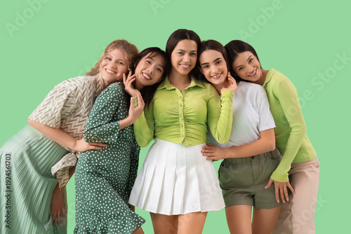 Group of young women huggin...