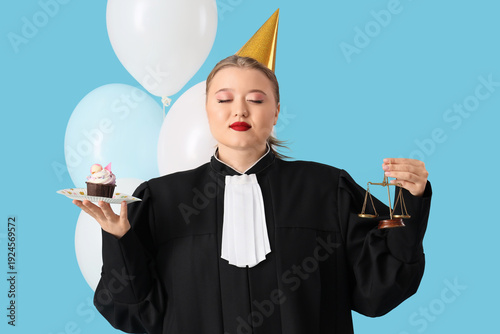 Young female judge in party...