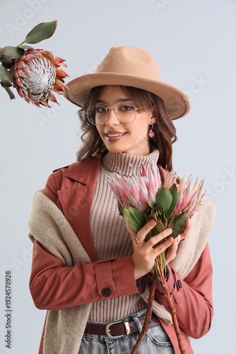 Stylish young woman with pr...