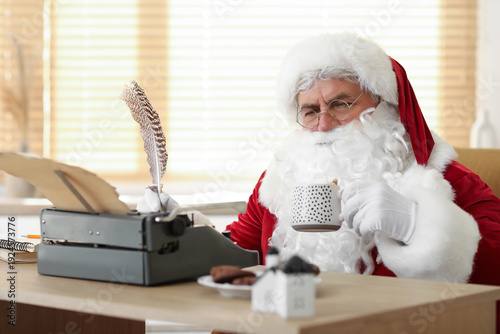 Santa Claus with typewriter...