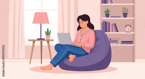 Productive Home Comfort: Woman Working on Laptop from Bean Bag Chair