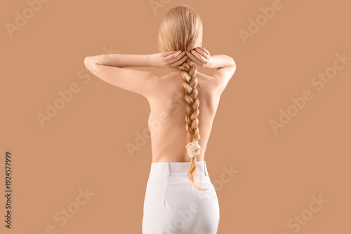 Beautiful young woman with ...