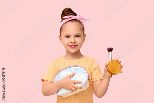Cute little girl with cosme...