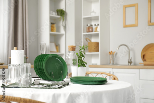 Set of clean dishes and gla...