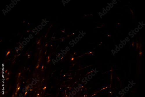 Dynamic Orange Light Streaks and Sparks on Black Background Abstract Overlay