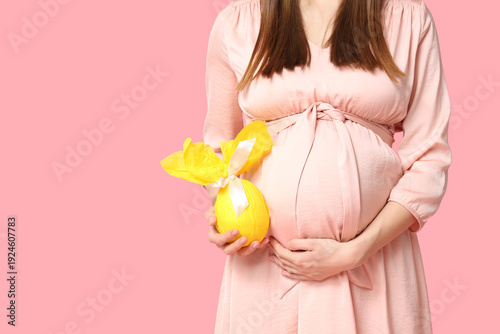 Young pregnant woman with E...