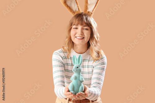 Young girl with Easter bunn...