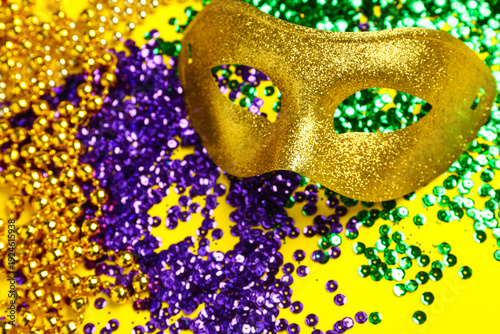 Shiny carnival mask with de...