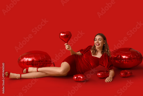Young woman with heart-shap...