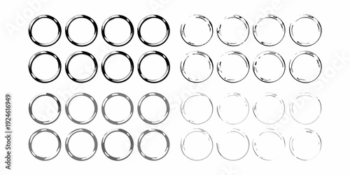 Arrangement of metallic rings in a grid like pattern on white