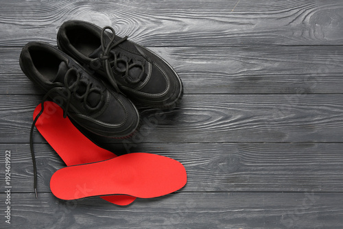 Pair of stylish sneakers an...