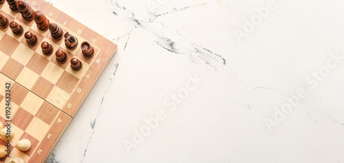 Photos Chess pieces and chequerboard on light background with space for text, top view