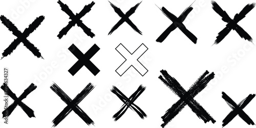 A collection of black and white x marks on a plain background