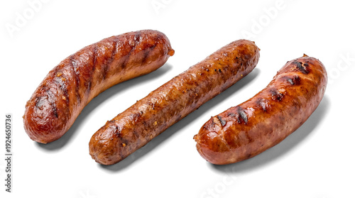 Quadro su tela three appetizing grilled sausages, showcasing distinct grill marks and visible pepper seasoning, presented on a sleek transparent background for dynamic food imagery and impactful advertising
