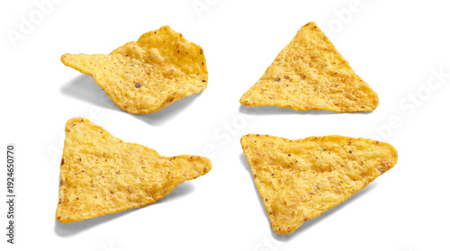 Canvas-taulu top view photograph of four crunchy corn tortilla chips arranged in a square formation against a plain transparent background, highlighting their texture and shape