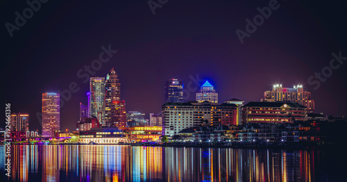 Quadro su tela Panoramic Tampa Downtown Skyline at Night with Colorful Reflections