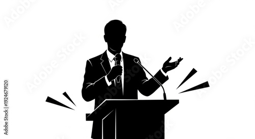 Silhouette of a man in a suit giving a speech at a podium