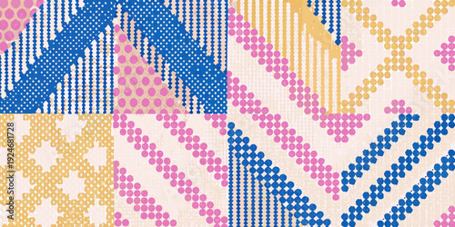 Colorful patchwork quilt with varied geometric patterns and textures