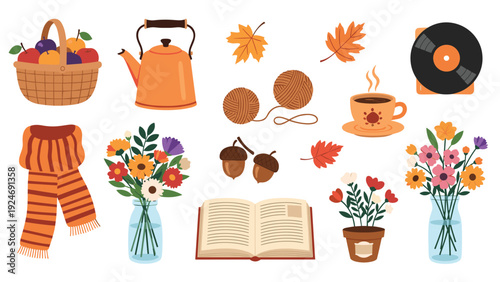 cozy autumn collection of seasonal items like a fruit basket, kettle, tea, book, and flowers for warm home vibes.
