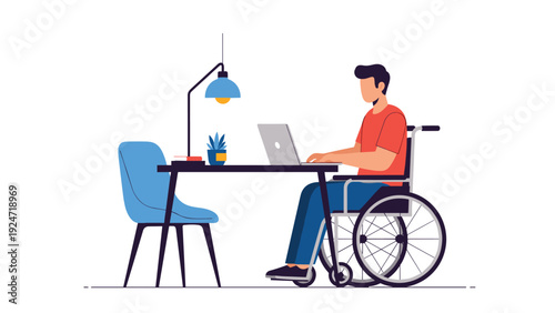 Professional man sitting in a wheelchair while working on a laptop at a desk in a modern office with minimalist decor.