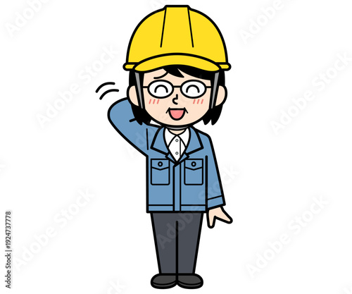 照れているヘルメットをかぶった現場監督の中年女性