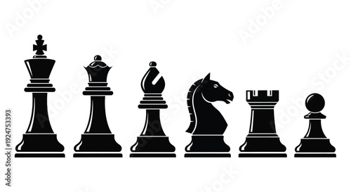 Black chess pieces arranged in a row including a king queen and knight