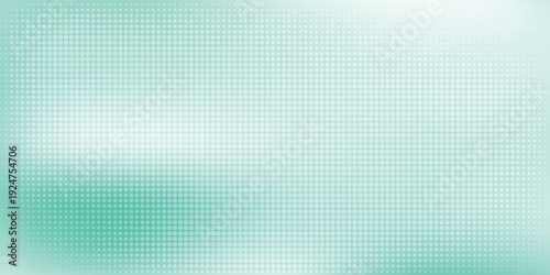 Abstract mint green background with soft white halftone dot pattern.