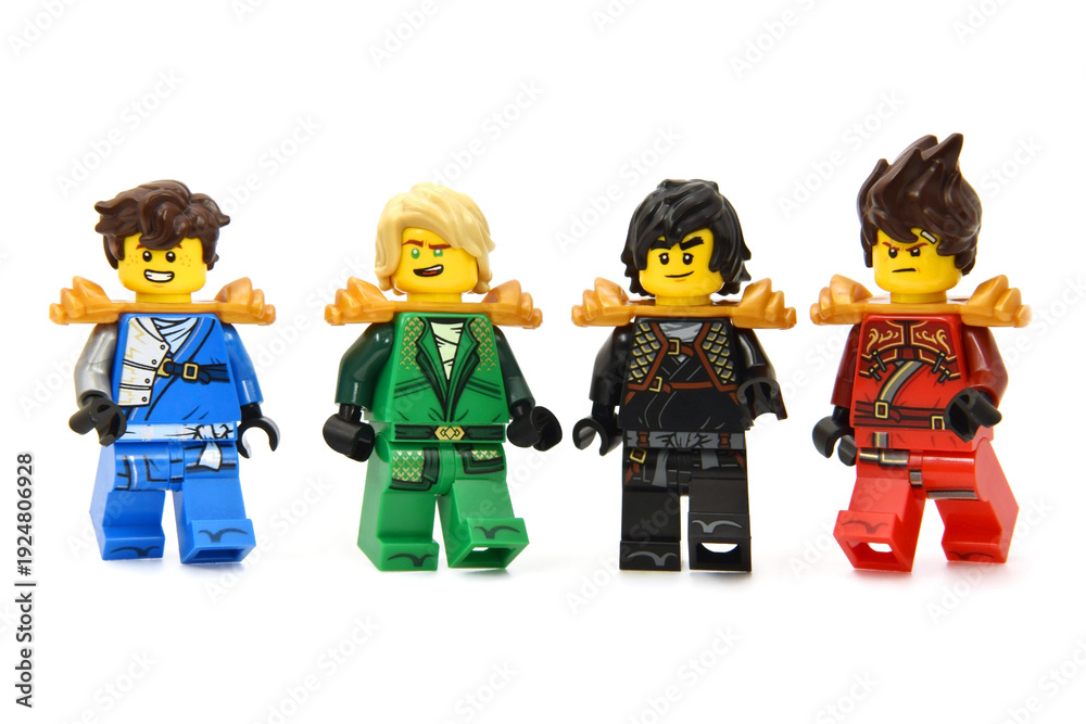 Fototapeta premium Editorial illustrative image of meeting of two lego ninjago minifigures teamisolated on white. Popular lego theme to 15 Years edition.