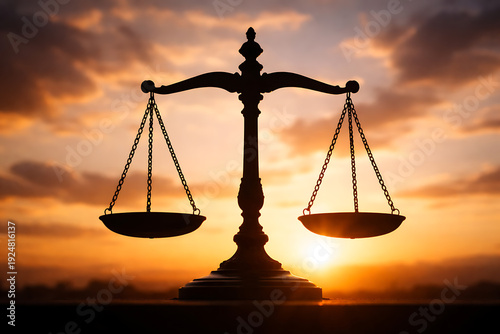 The Scales of Justice Silhouette Against the Sunset: Symbolizing fairness, balance, and the essence of law and order. A compelling visual representation of ethical principles and the pursuit of truth.