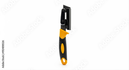Ergonomic joint knife with black and yellow handle, isolated on a clean white background, showcasing durable design and sharp blade