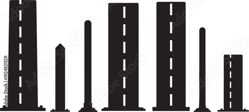 Silhouette of city skyline with tall buildings and roads