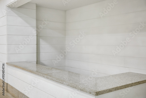 Minimal white interior counter with clean architectural lines