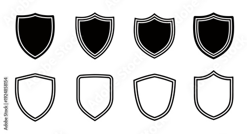 Set of shield emblems in solid and outline styles.