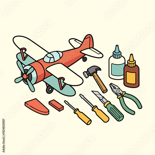 Vintage airplane model being assembled with tools and adhesives on a work surface viewed from above