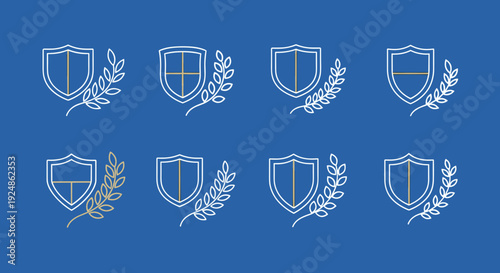 Collection of Shield Icons with Laurel Wreaths.
