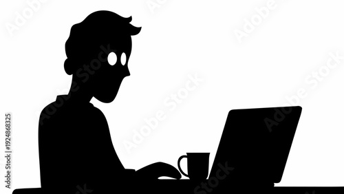 Man working on laptop with coffee cup nearby
