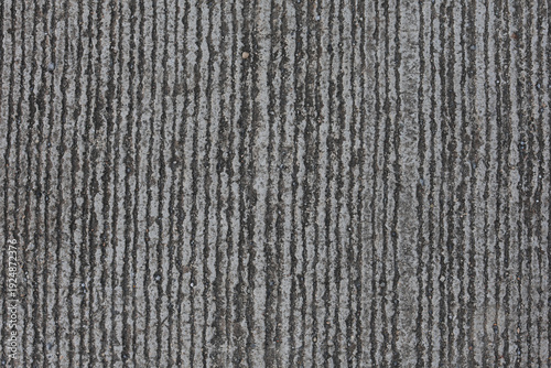 The concrete surface has grooves (close-up photograph).